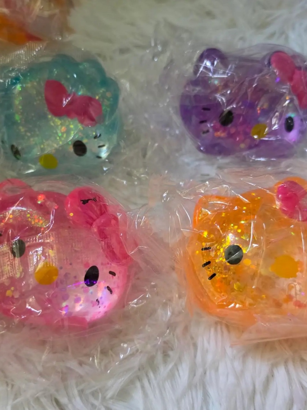 Glitter Hello Kitty Squishy - Pink, Orange, Purple, Teal